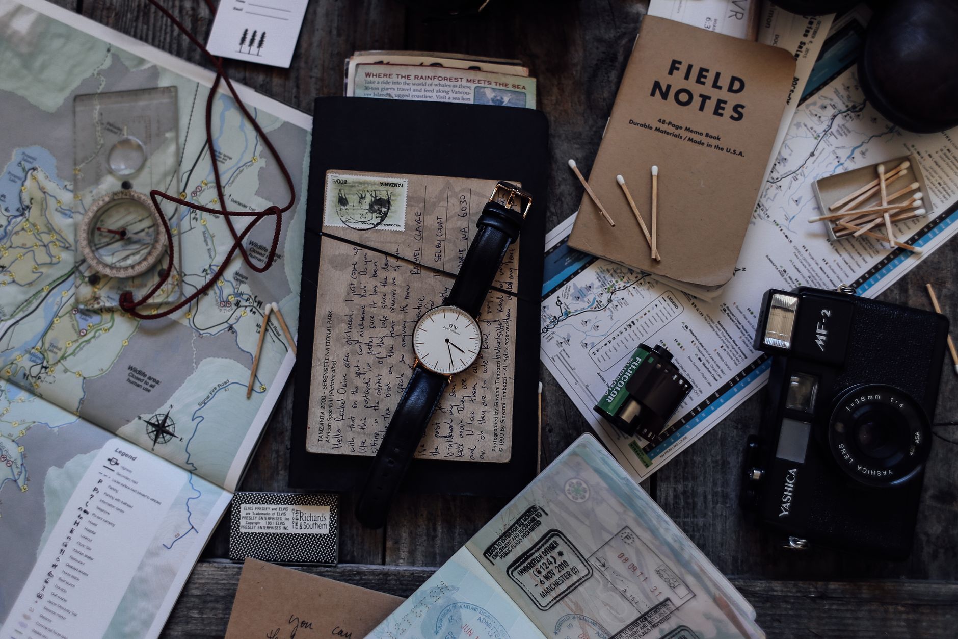 Custom itinerary notebook and camera